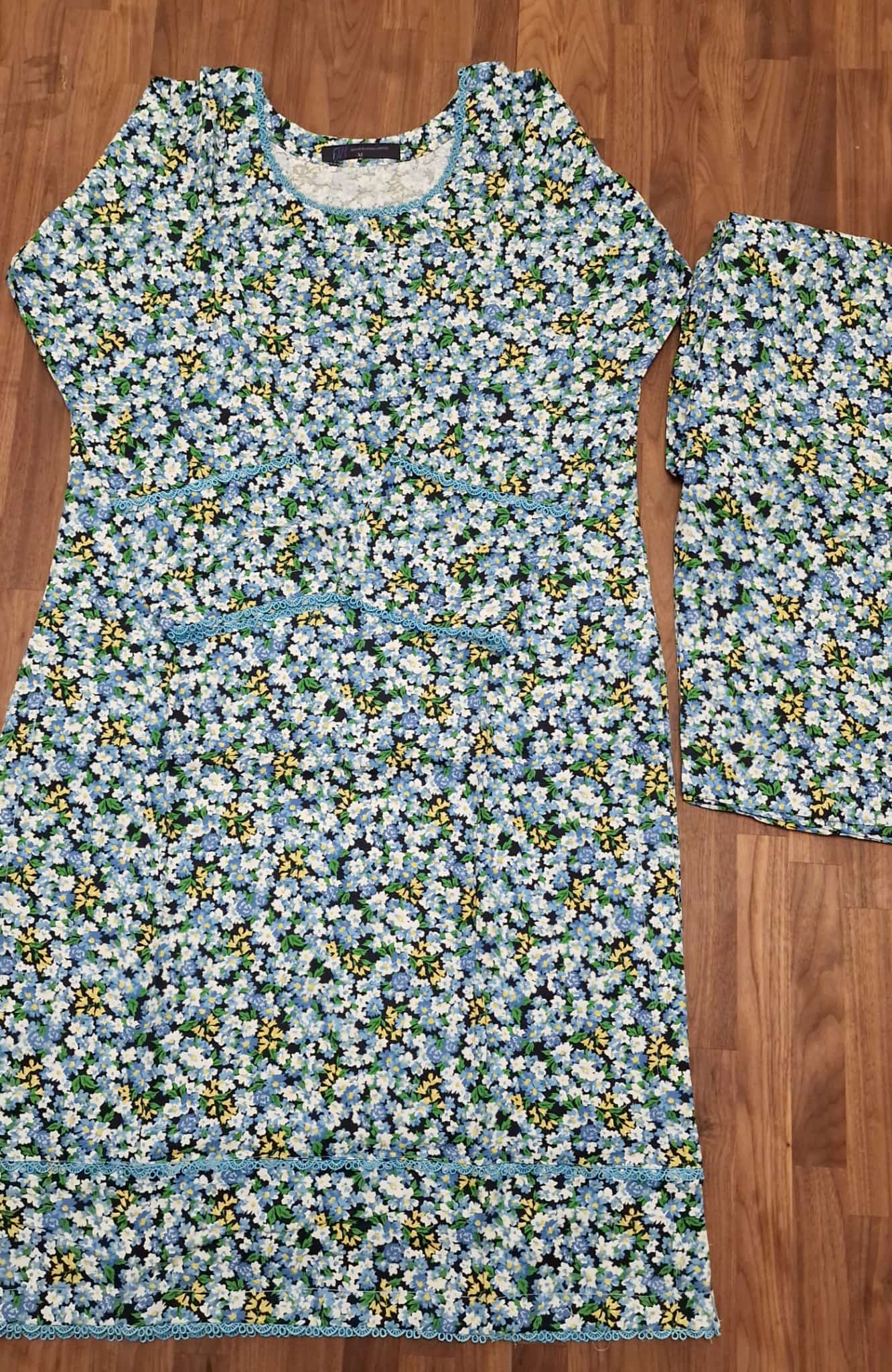 Marina Suit- Black base with white, blue yellow floral design